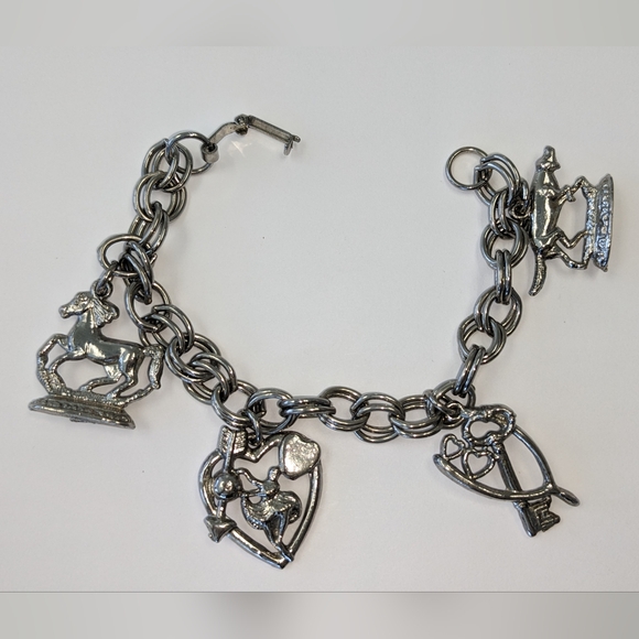 EVC SILVER TONE CHARM BRACELET - Picture 1 of 14